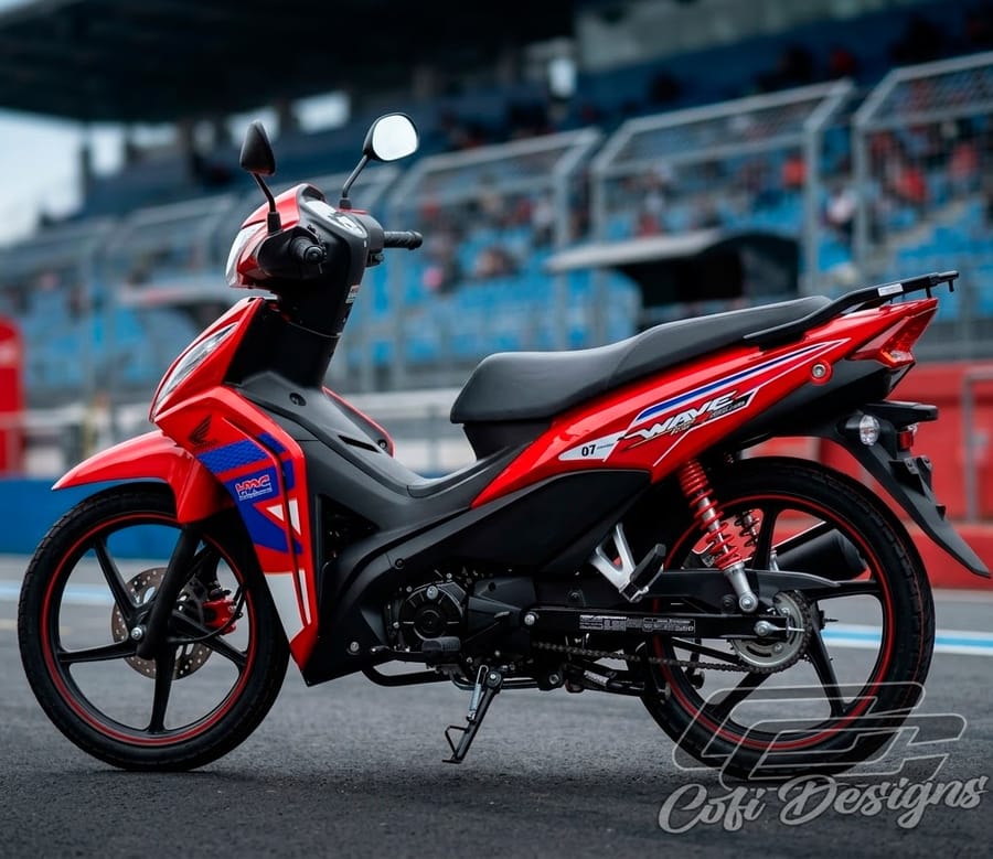 Moto Honda Wave wrapeada en rojo con diseño deportivo